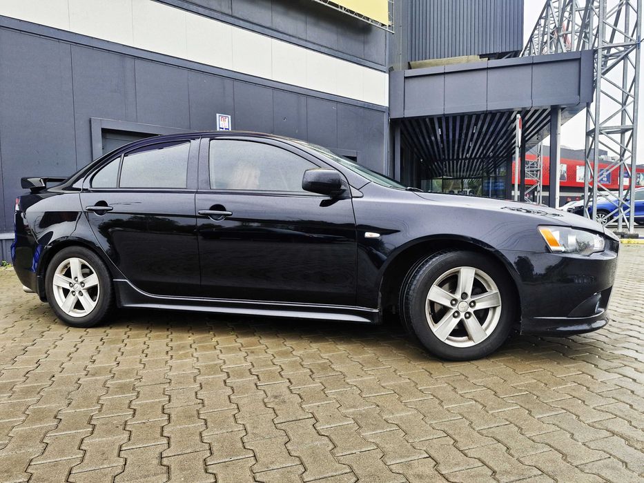 Митсубиши Лансер Х