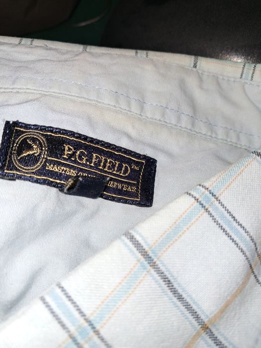 20 чоловічих фірмових сорочок, тенісок.