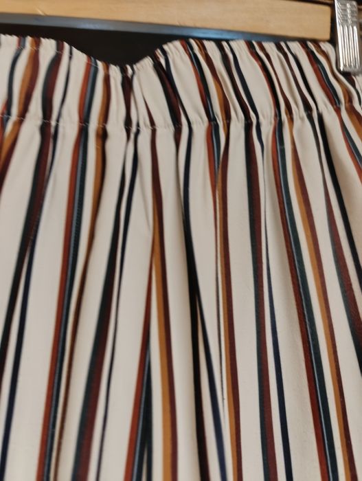 Calças fluidas, de pernas largas,muito elegantes