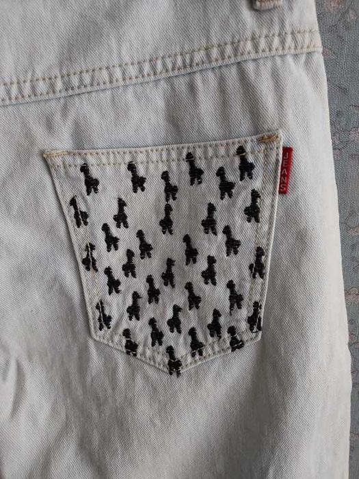 Spodnie jeansowe krótkie z dziurami