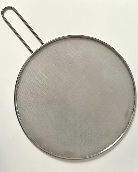 Tampa antissalpicos de inox