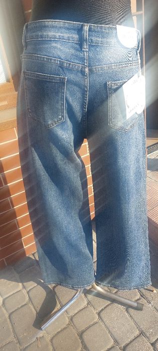 Damskie spodnie jeansowe roz xl