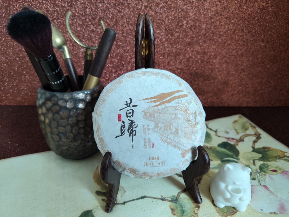 Tytuł: Herbata Pu-erh Sheng Xigui (昔归) – Herbata Prasowana, Ciastko 100g