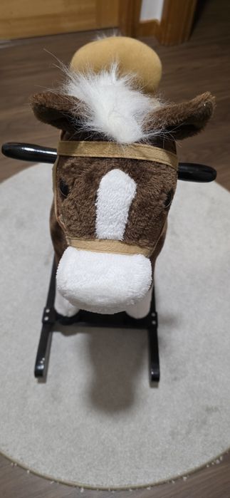 Cavalo de balanço Criança