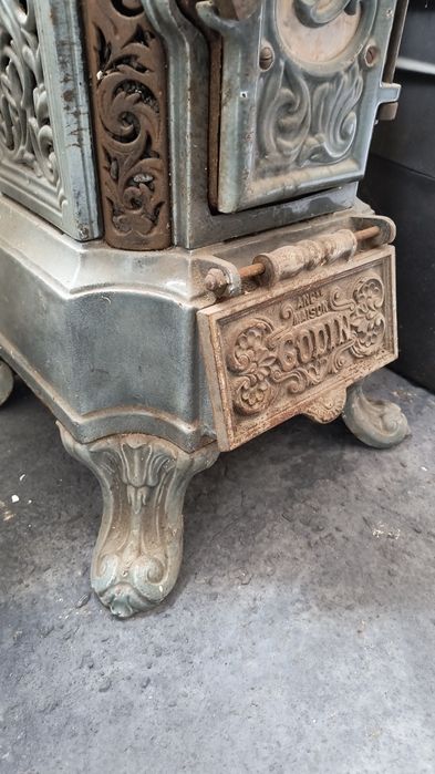 Stary emaliowany piecyk kominek koza