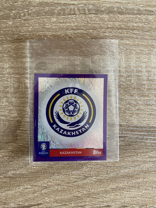 Topps Euro 2024 - Simbolo Cazaquistão Roxo (Raro)