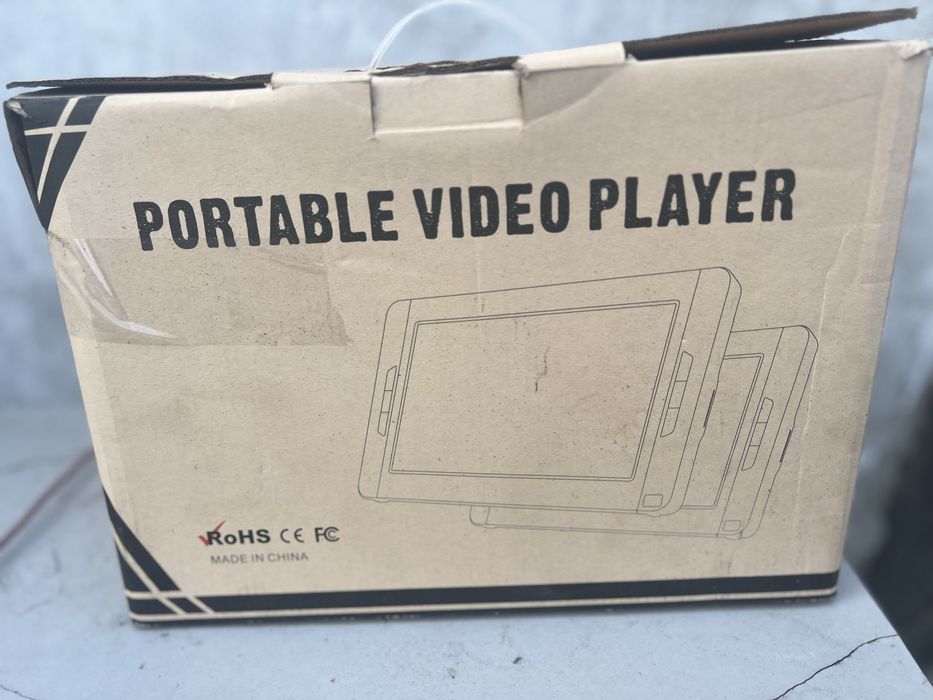 Портативний DVD в авто