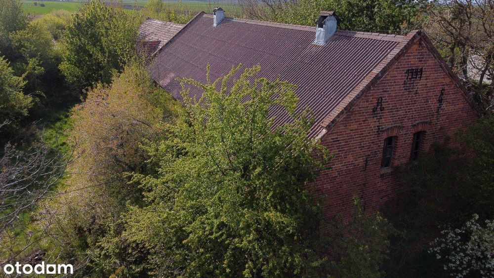 Nieruchomość z dużym budynkiem gospodarczym 324 m² i działką 2400 m²