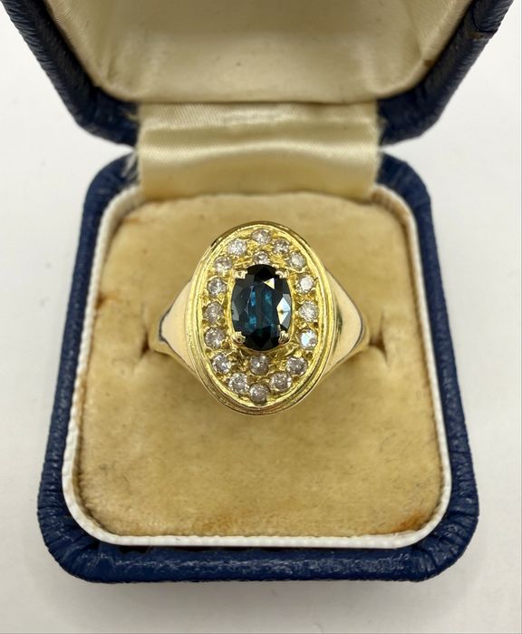 Złoty pierścionek 750 z szafirem 0,50ct i diamentami 0,25ct