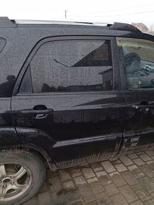 KIA SPORTAGE II DRZWI PRAWE TYLNE TYŁ GOŁE 9P
