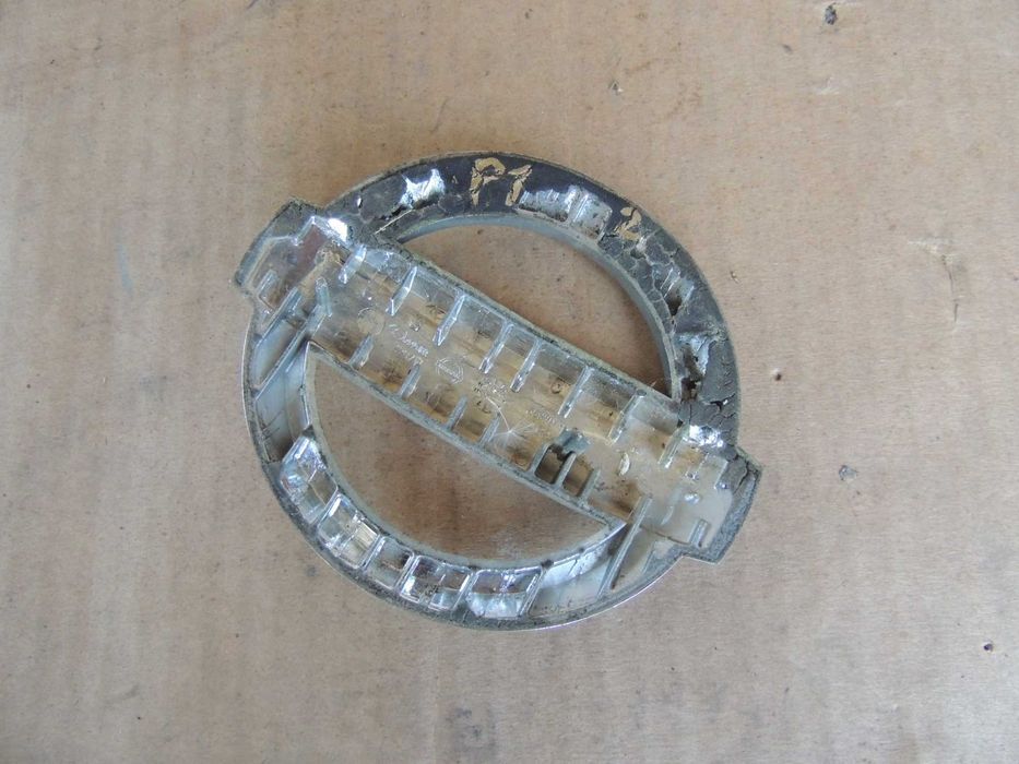 Znaczek emblemat logo Nissan przedni Primera P12 02-07