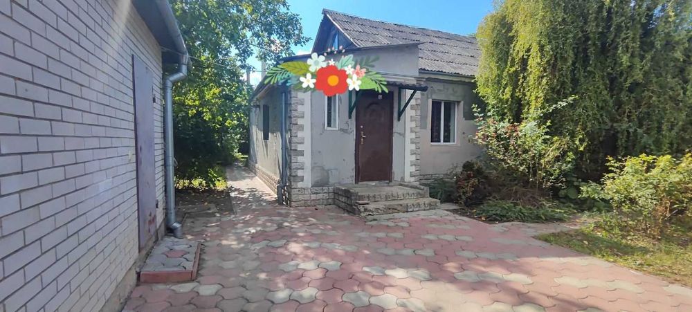 Продається одноповерховий цегляний будинок земельною ділянкою