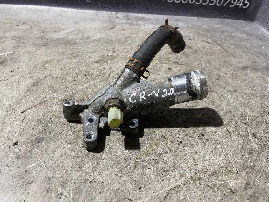 Фланець системи охолодження патрубок ГБЦ Honda CR-V 2.0 i-VTEC