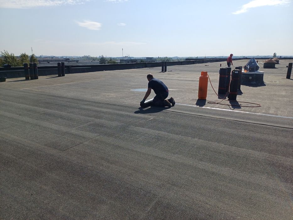 Покрівля дахів євро рубероїдом