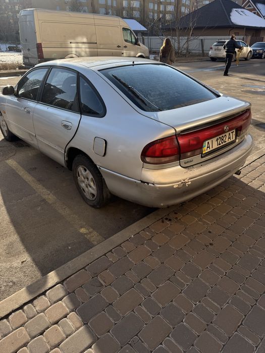 Разборка Mazda 626  323  Акпп  premasy Мазда 626 1998 2.0 бен Двигатель ГБО