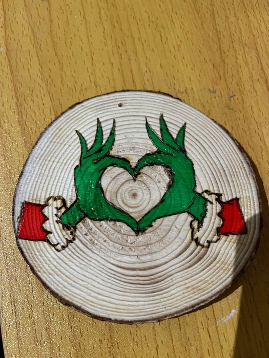 Enfeites de Natal gravado na madeira