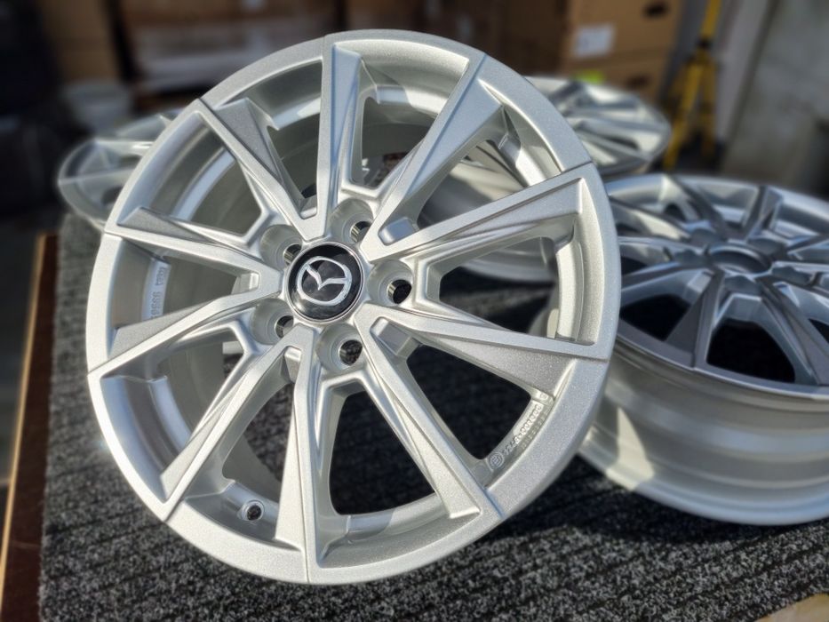 Felgi 15 " Mazda Mazda2 Hybrid XP210 [2021-obecnie) Nowe alu Srebrne