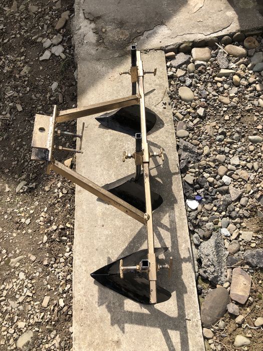 Плуги (марка) до мотоблока