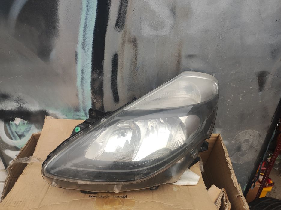 Lampa Clio 3 lift 09-12 lewa orginalna