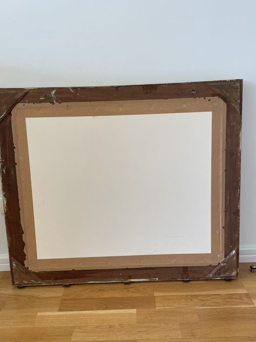 Espelho com moldura em talha dourada