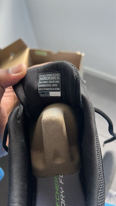 Sapatilha preta de Skechers