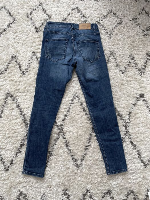 Jeansy ciemne rurki H&M divided dziury przetarcia S/36