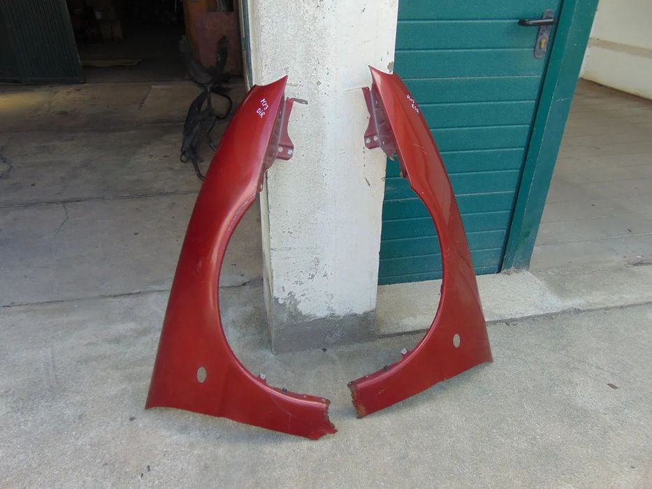 Mazda MX3 guarda lamas
