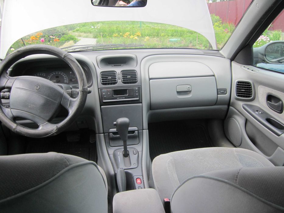Renault Laguna 2.0 1999 Обшивка салона тормозний механізм лючок бака