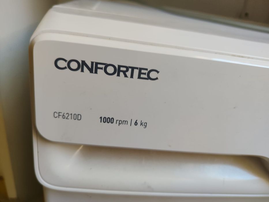 Cama e máquina de lavar