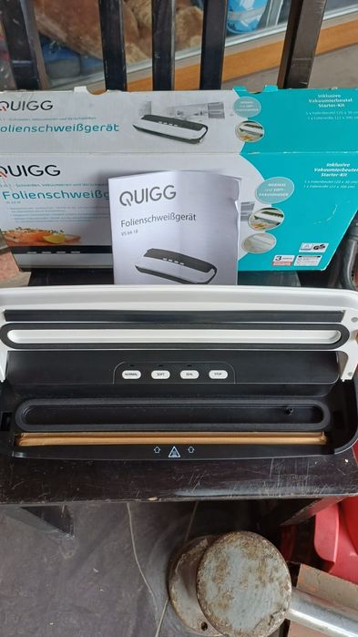 Вакуумний пакувальник QUIG