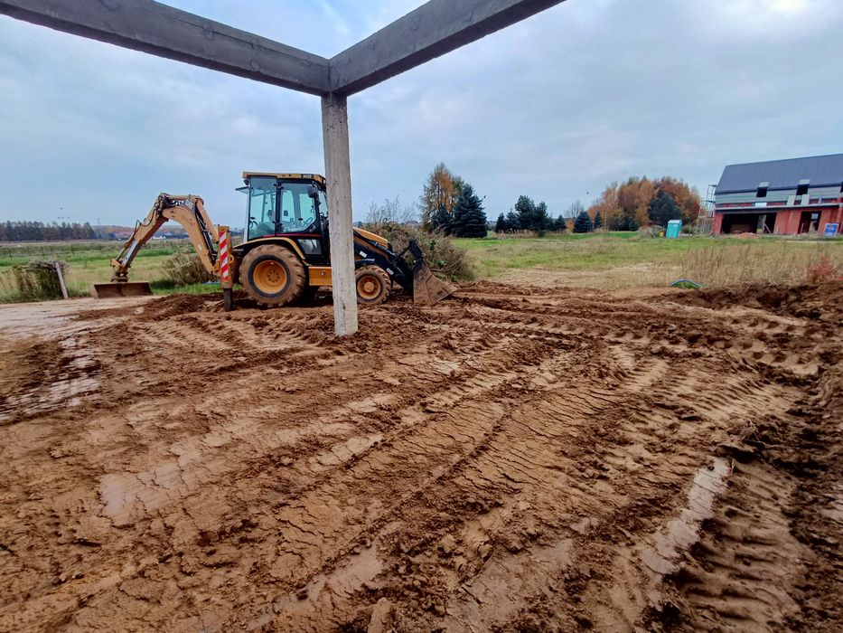 Transport, minikoparka, koparko ładowarka, kucie betonu, kostka brukow