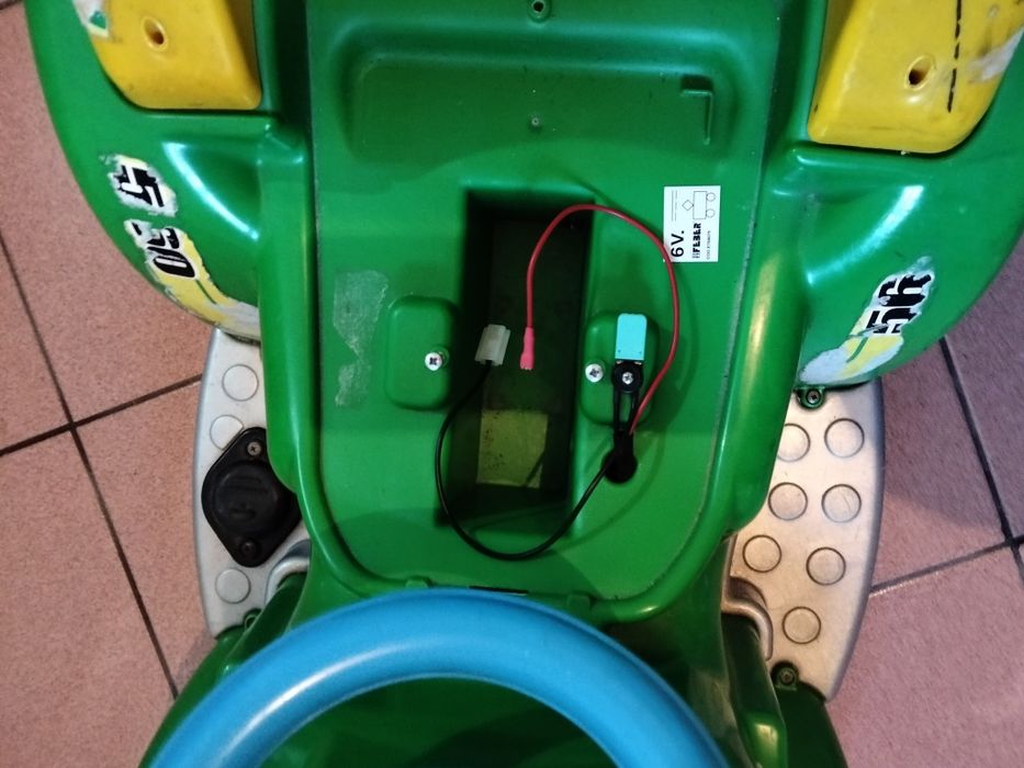 brinquedo em Trator . 
É um brinquedo