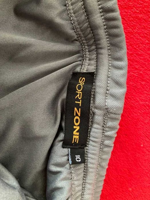 Conjunto desporto/ginástica tam 10/12 anos cinza/laranja SALDOS