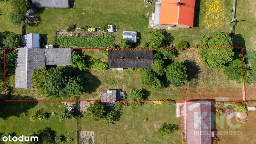 Działka 0,89 ha wraz z zabudowaniami