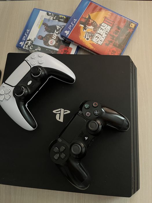 PlayStation 4 PRO 1TB + 2 PADA + 2 Gry RDR2 i UFC