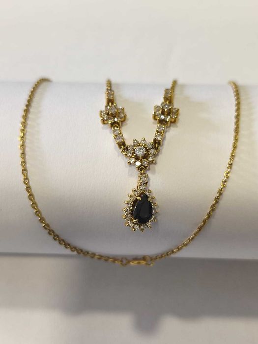 Colar em ouro 19,2 e com 53 pedras de diamantes