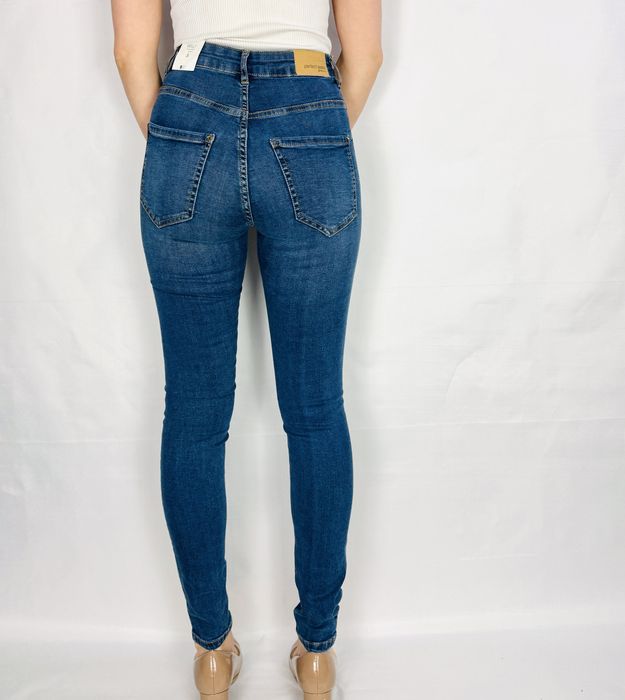 Ciemnoniebieskie jeansy z wysokim stanem S 36