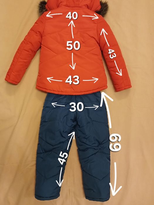 Продам зимний комбинезон для девочки