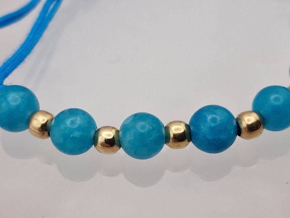 Nowa złota bransoletka, próba 585, masa złota 0.99 gr