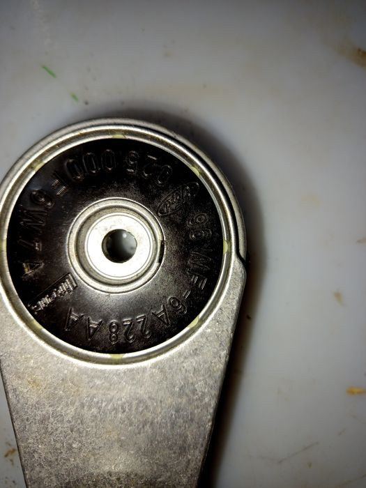 Натяжитель ремня генератора