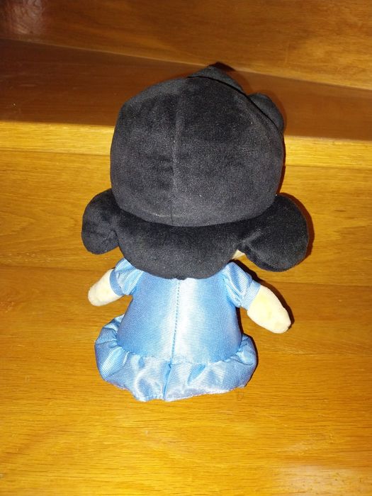 Lucy Van Pelt - Peluche Snoopy