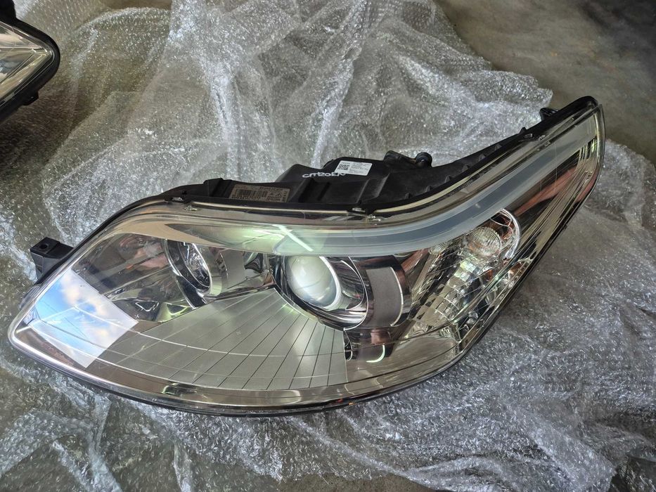 oticas farois xenon citroen c4
