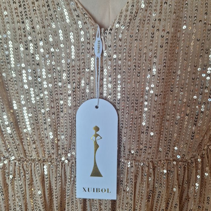 Elegancka złota sukienka ze złotymi cekinami świecąca nowa z metka