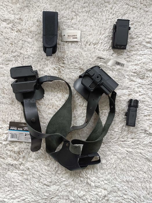 Akcesoria militarne.Ładownica,szelki...