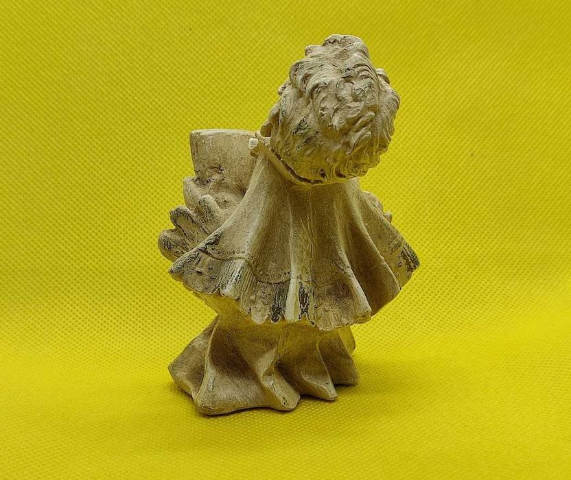 Artigo decorativo menino cantar criança livro contemplação