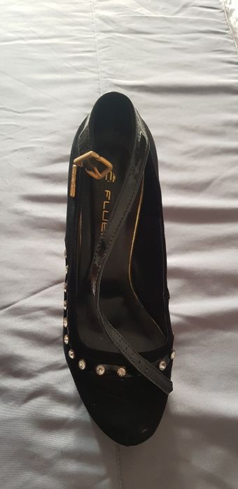 Sapatos de salto alto