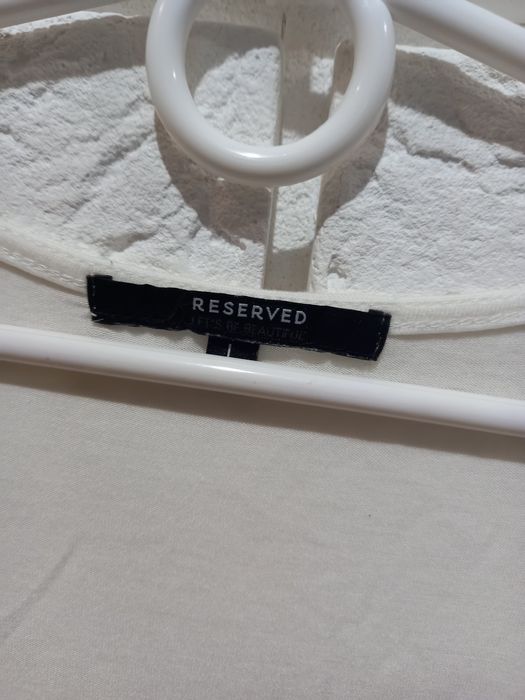 Bluzka z cekinami Reserved L