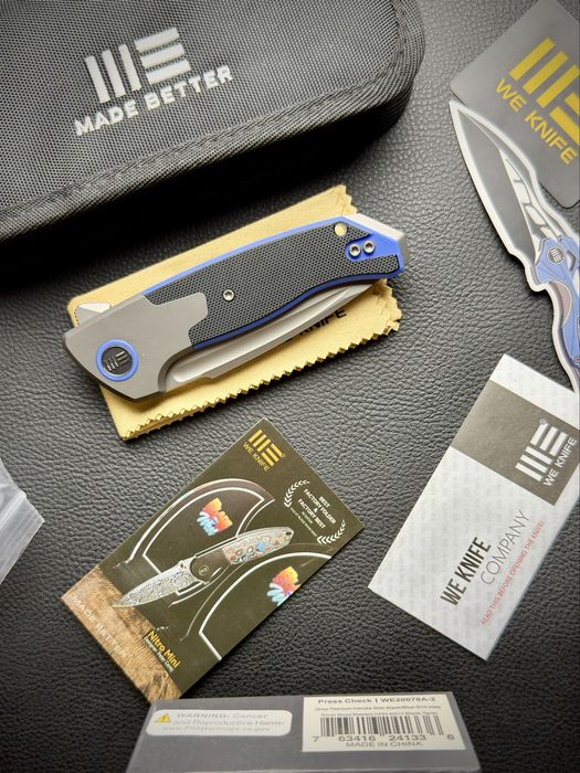Нож WE Knife Press Check Flipper Elishewitz Titanium Blue G10 CPM-20CV