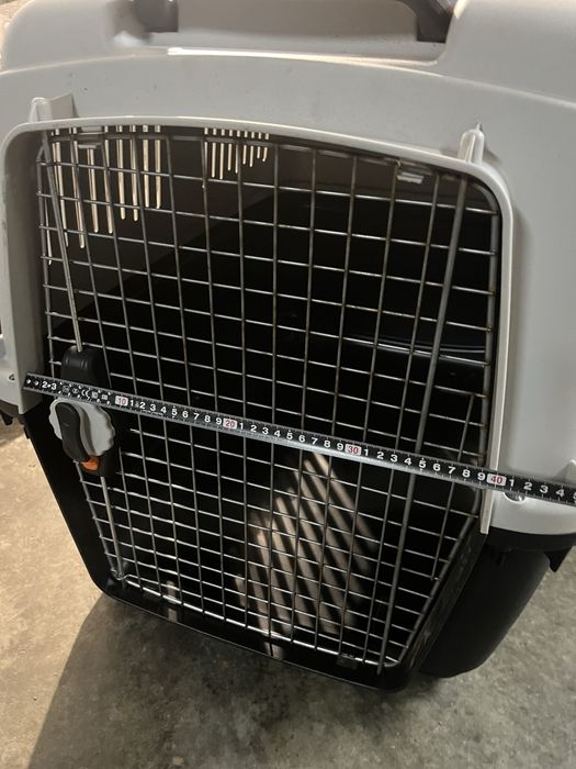 Caixa transportadora de cão