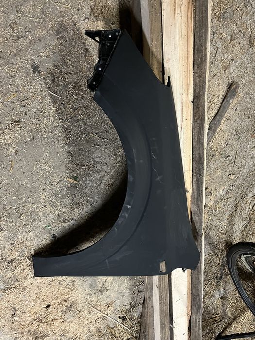 lewy błotnik w podkladzie Opel Astra H